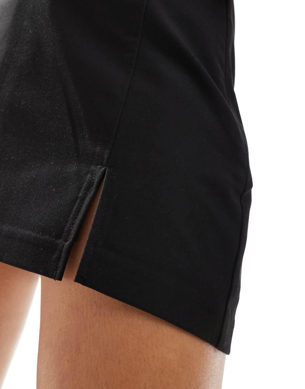 Stradivarius 90s mini skort in black Product Image