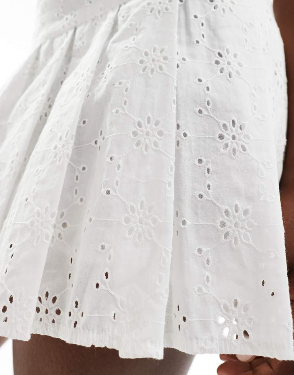 ASOS DESIGN pleated mini skirt in white eyelet Product Image