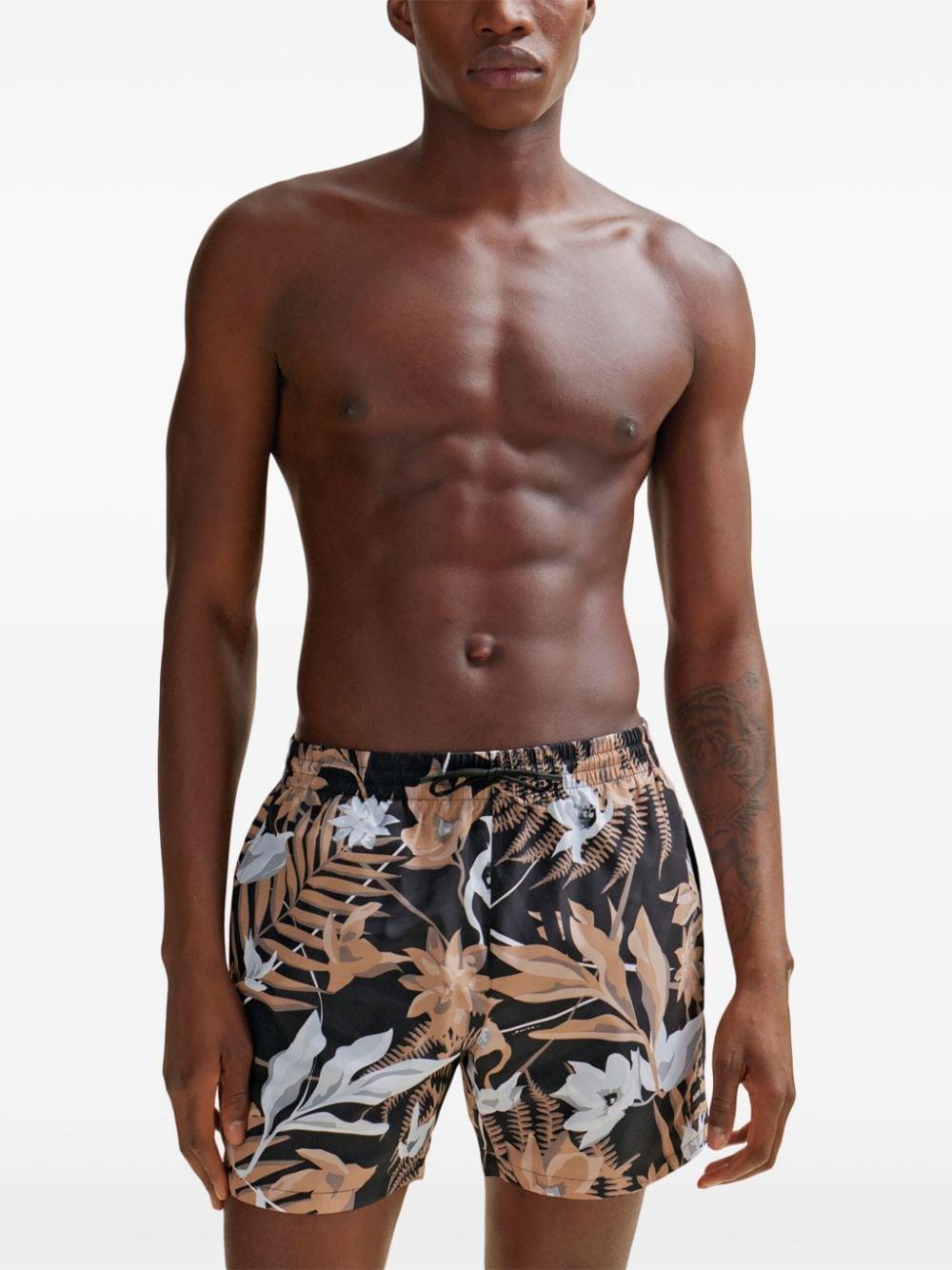 Tropical-print Quick-drying Swim Shorts With Logo Badge In Beige Product Image