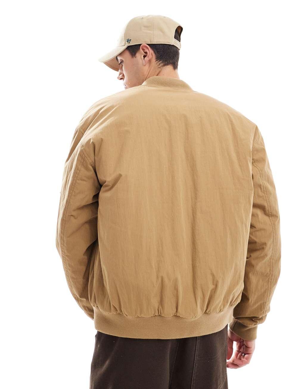 ASOS DESIGN oversized bomber jacket in tan Product Image