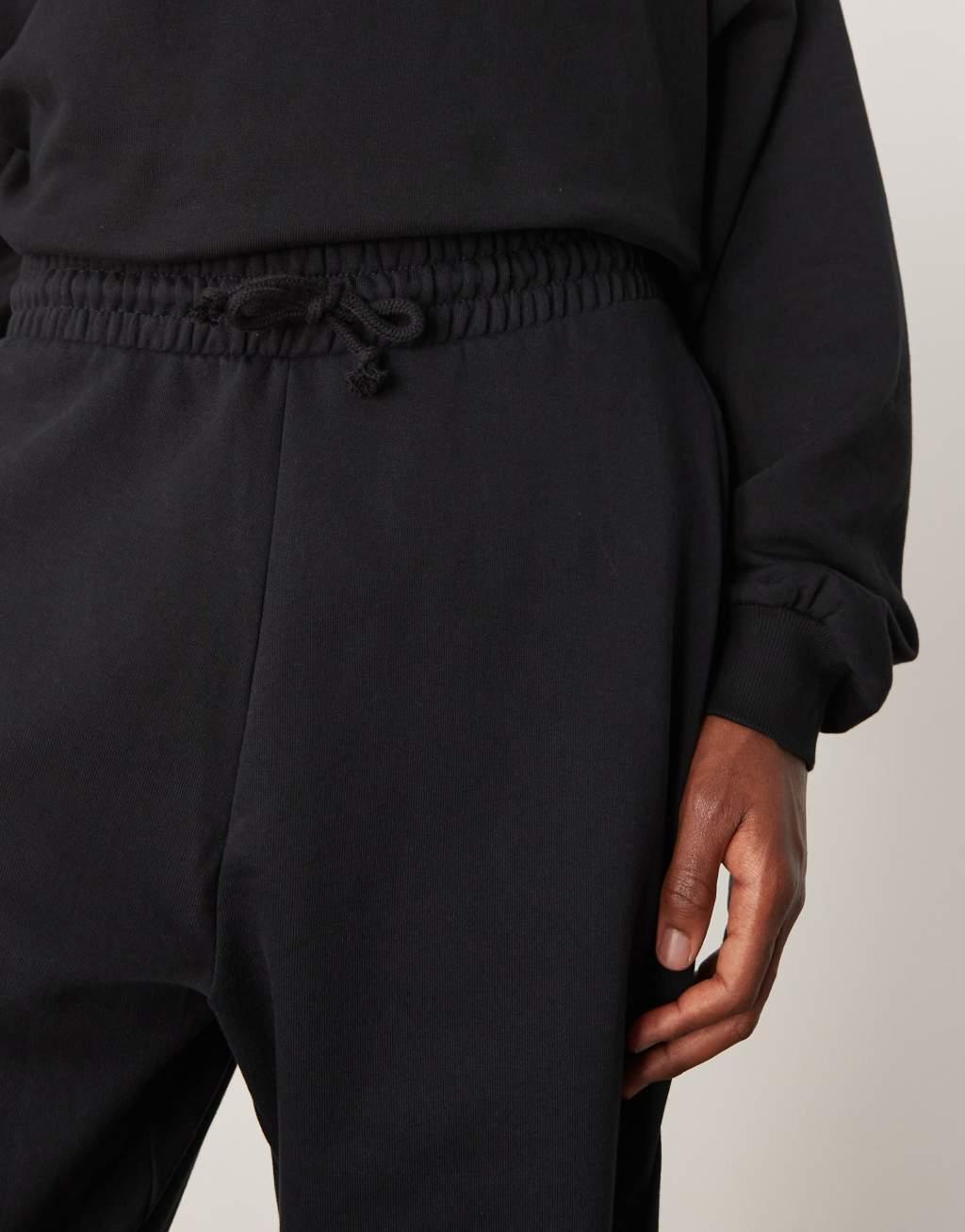 ASOS DESIGN essential oversized sweatpants in black Product Image