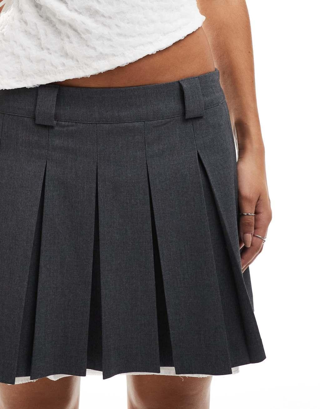 Monki pleated mini skirt with raw hem in gray Product Image