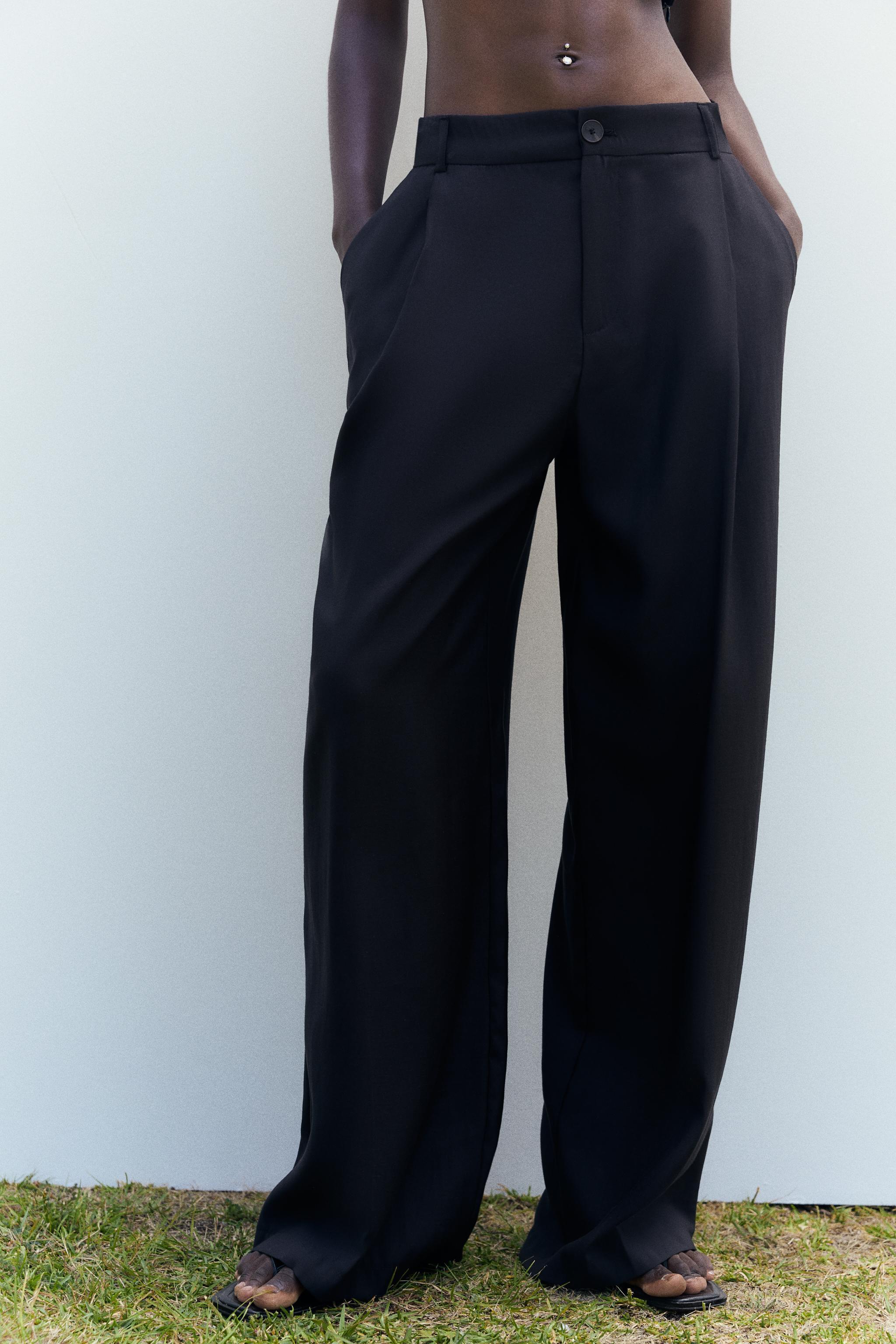 FLOWY PLEATED PANTS Product Image