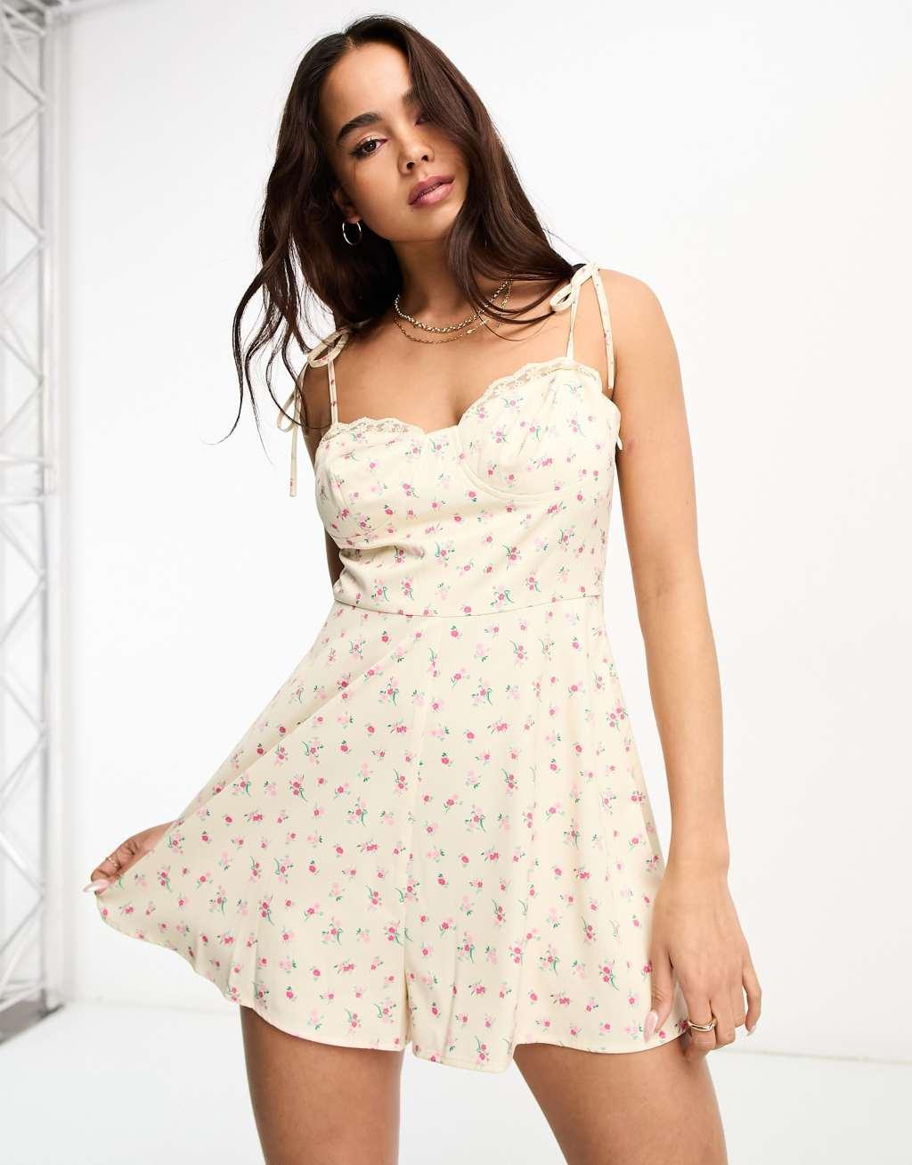 The Frolic cami romper with lace hem cup detail in vintage floral Product Image