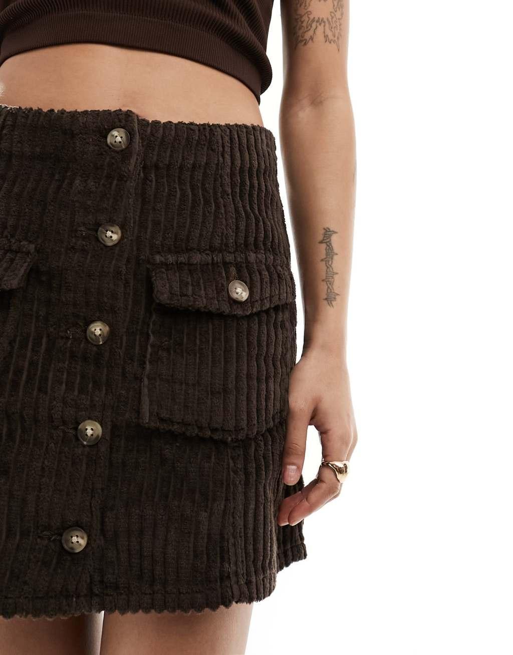 ASOS DESIGN Petite jumbo cord button through mini skirt in brown Product Image