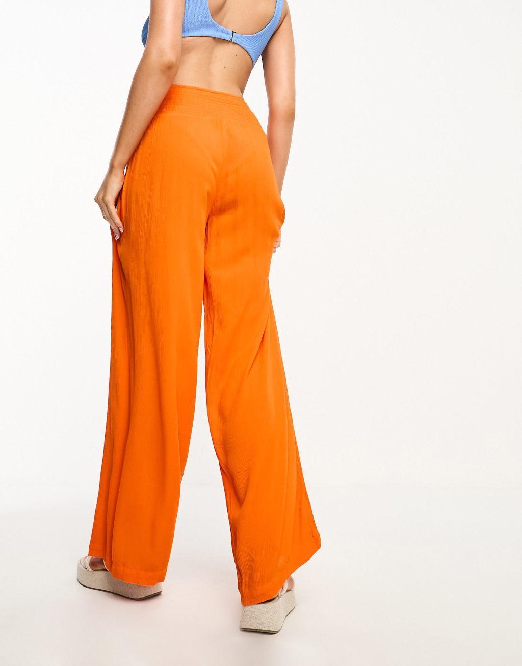 Vero Moda shirred waist beach pants in orange Product Image