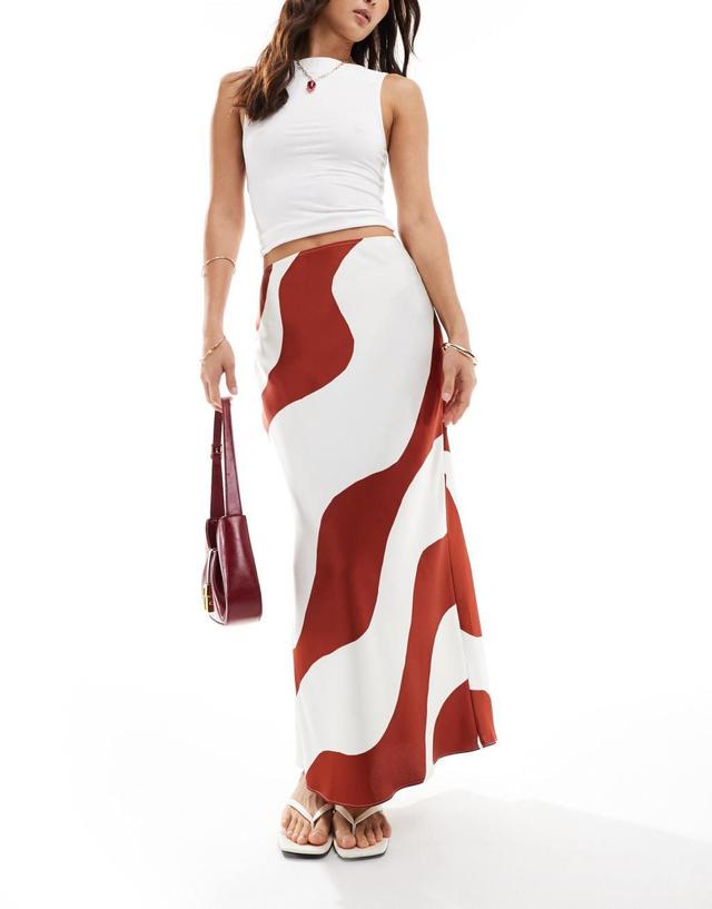 ASOS DESIGN satin bias midi skirt in red swirl print Product Image