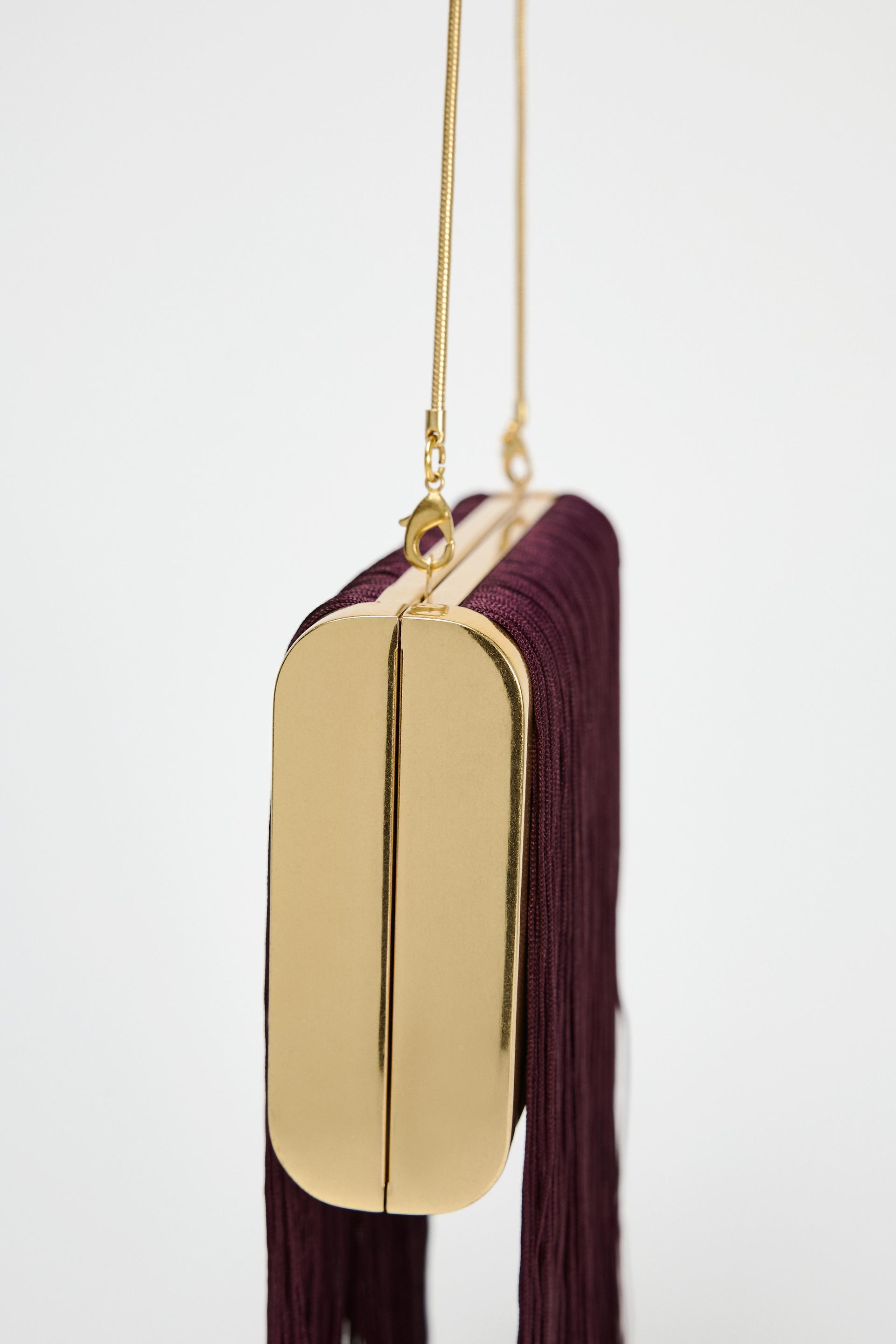 FRINGE CLUTCH Product Image