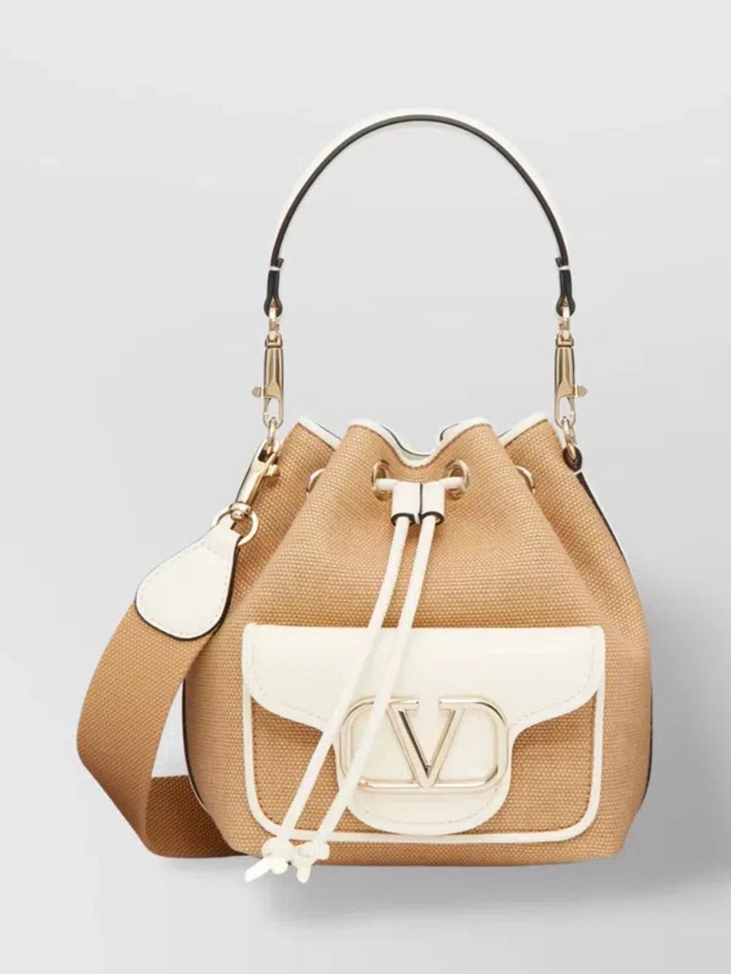 Loco Small Drawstring Bucket Bag In Beige Product Image