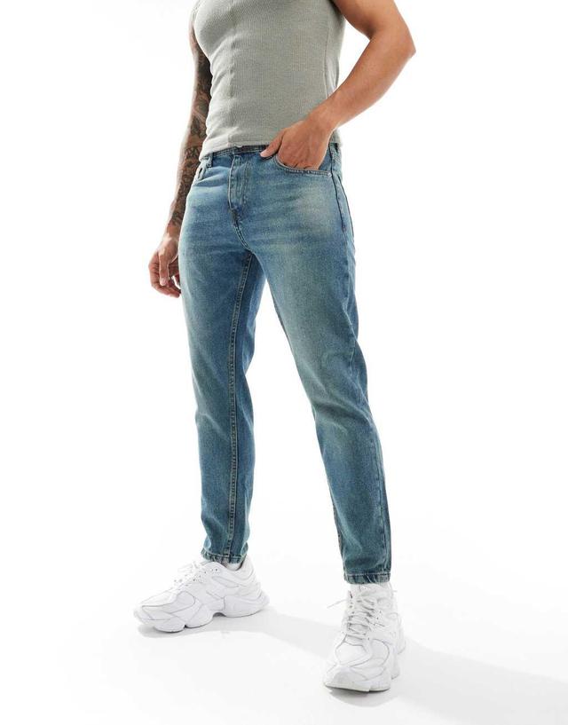 DTT rigid cropped tapered fit jeans in mid blue vintage tint Product Image