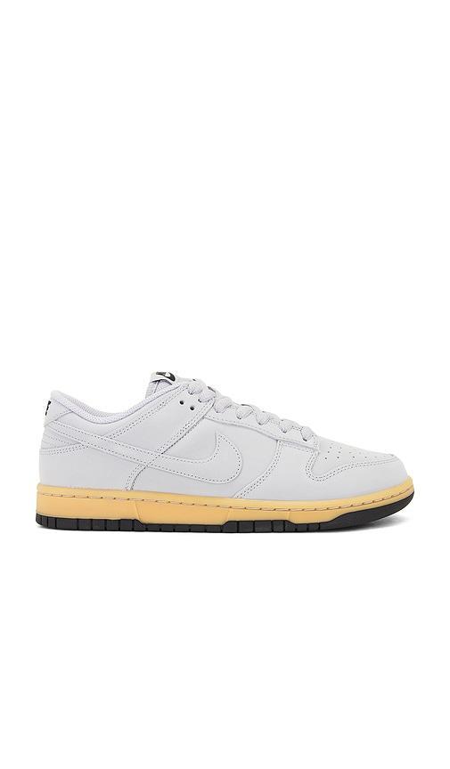 NIKE Dunk Low Retro Se In Wolf Grey  Gum Yellow  & Black Product Image