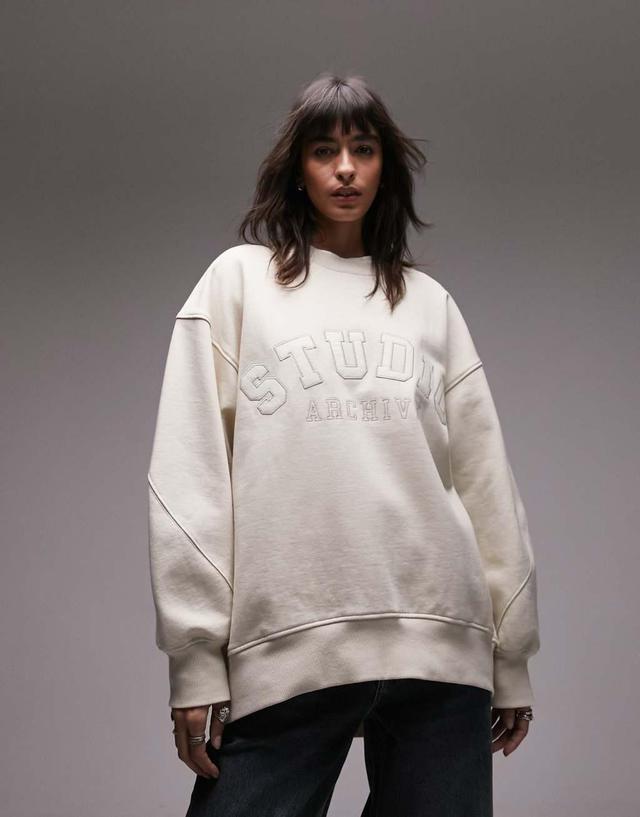 Topshop graphic studio oversized curved hem sweat in oat Product Image