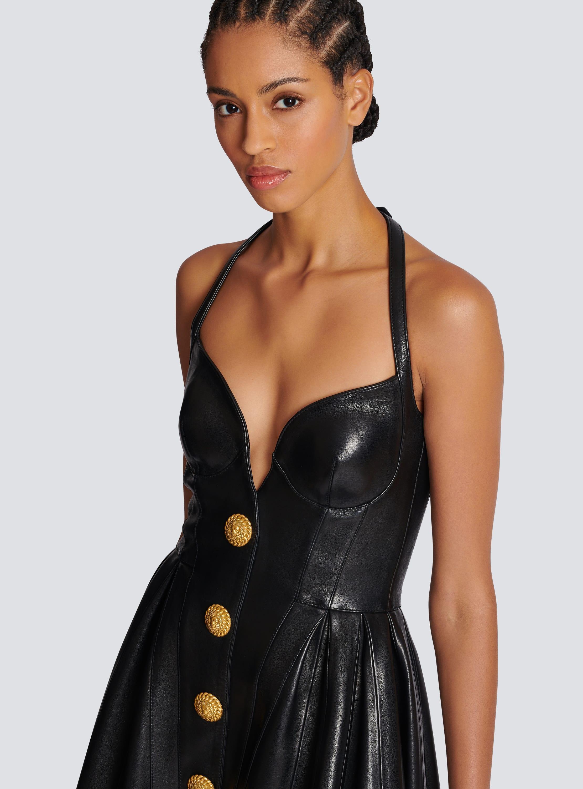 Flared pleated halterneck dress in leather Product Image