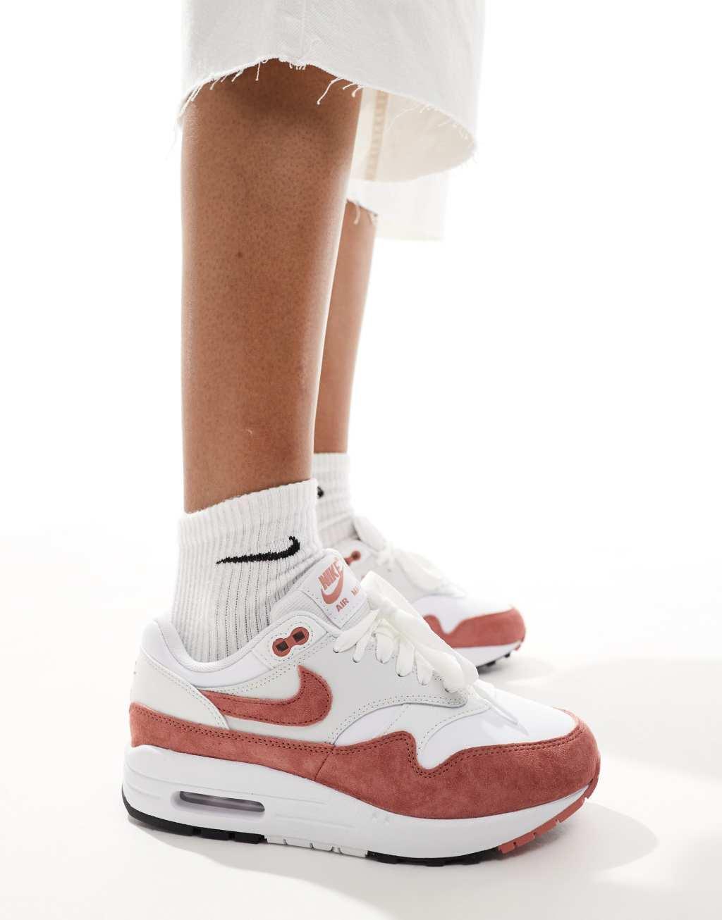 Nike Air Max 1 sneakers in white and pink Product Image