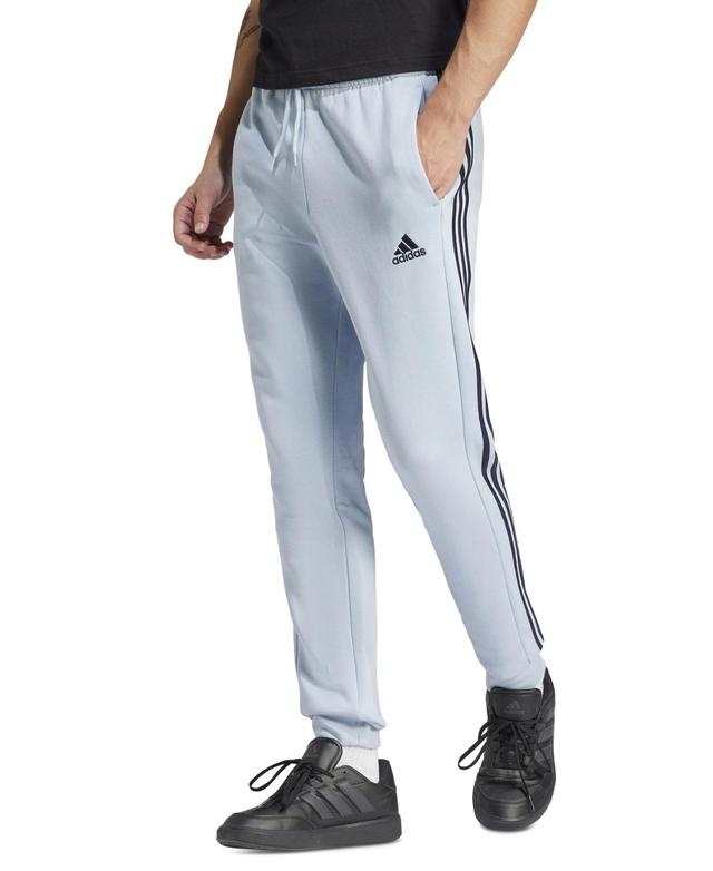 adidas Essentials Fleece Tapered Cuffed 3-Stripes Pants (Ink) Men's Clothing Product Image