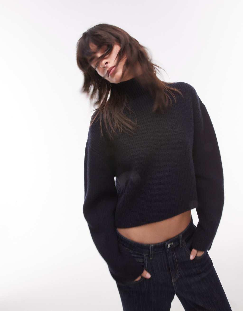 & Other Stories wool knit ribbed funnel neck sweater with split back neck and volume sleeves in dark blue Product Image