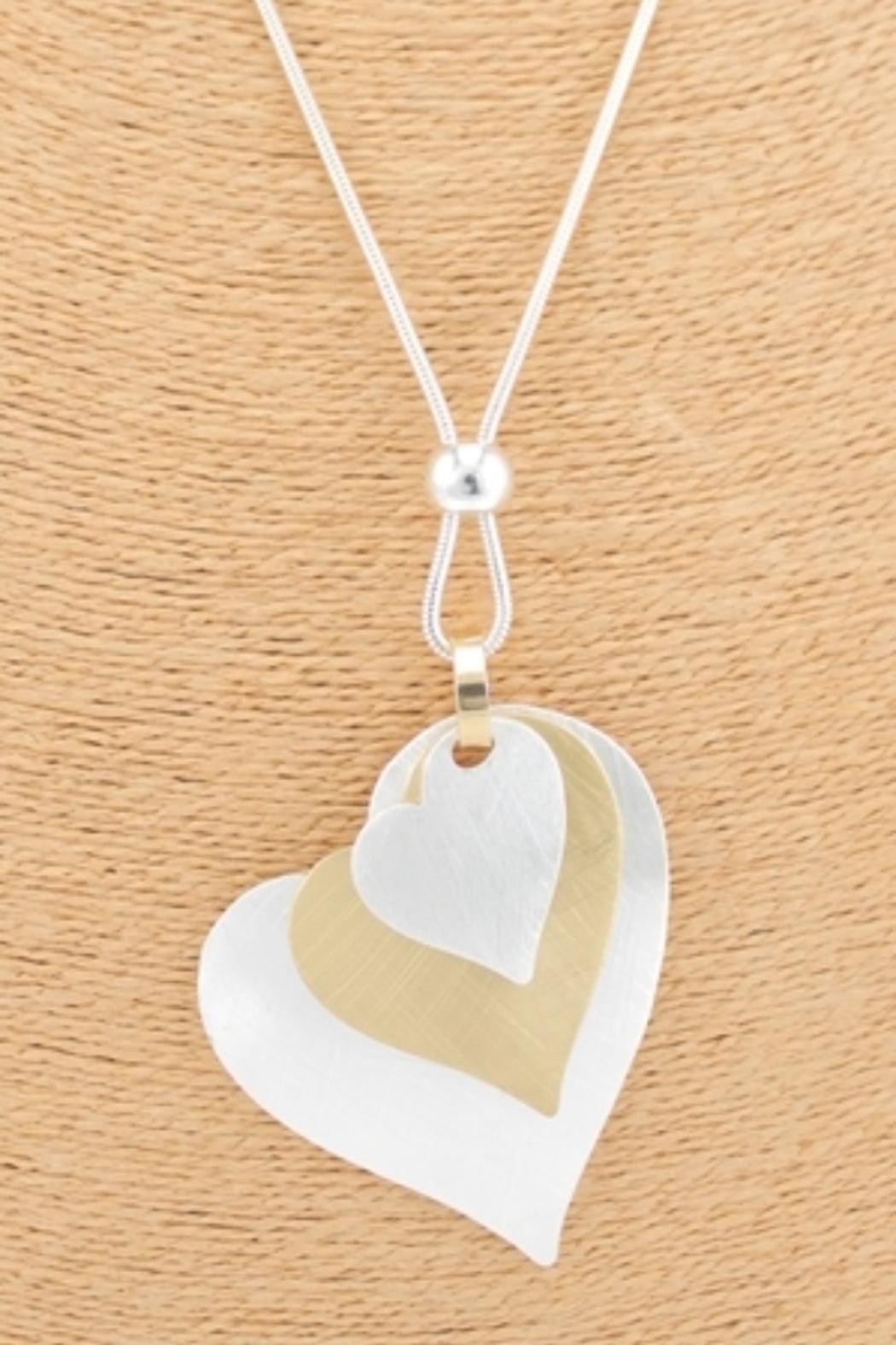 Triple Two-Tone Metal Hearts Pendant Female Product Image