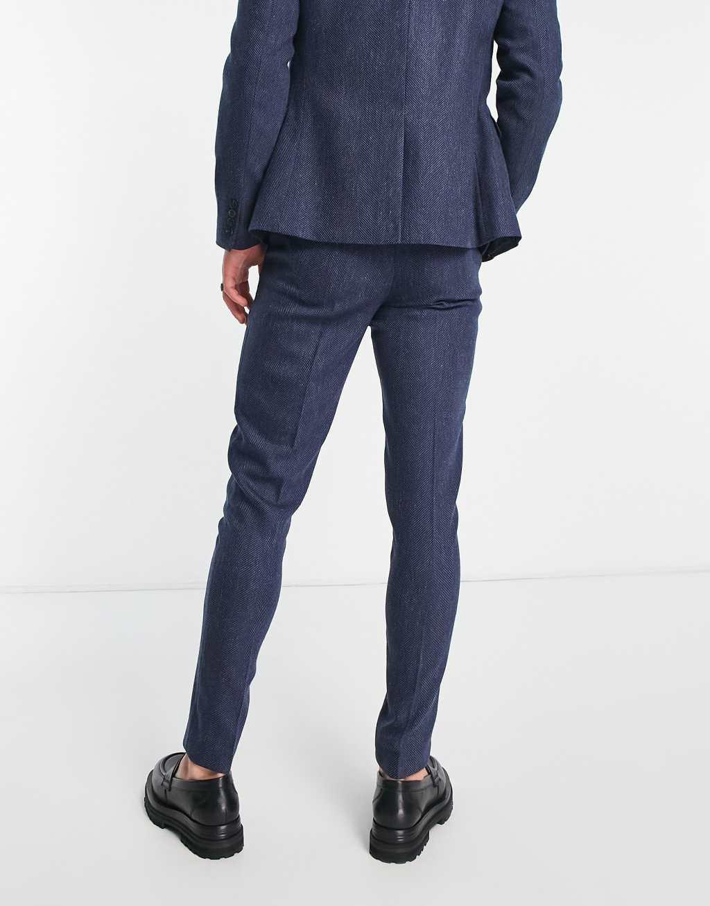 ASOS DESIGN wedding skinny wool mix suit pants in navy herringbone Product Image