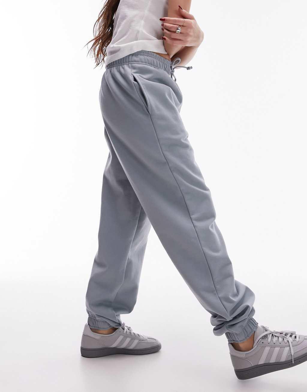 Topshop oversized cuffed sweatpants in soft blue Product Image