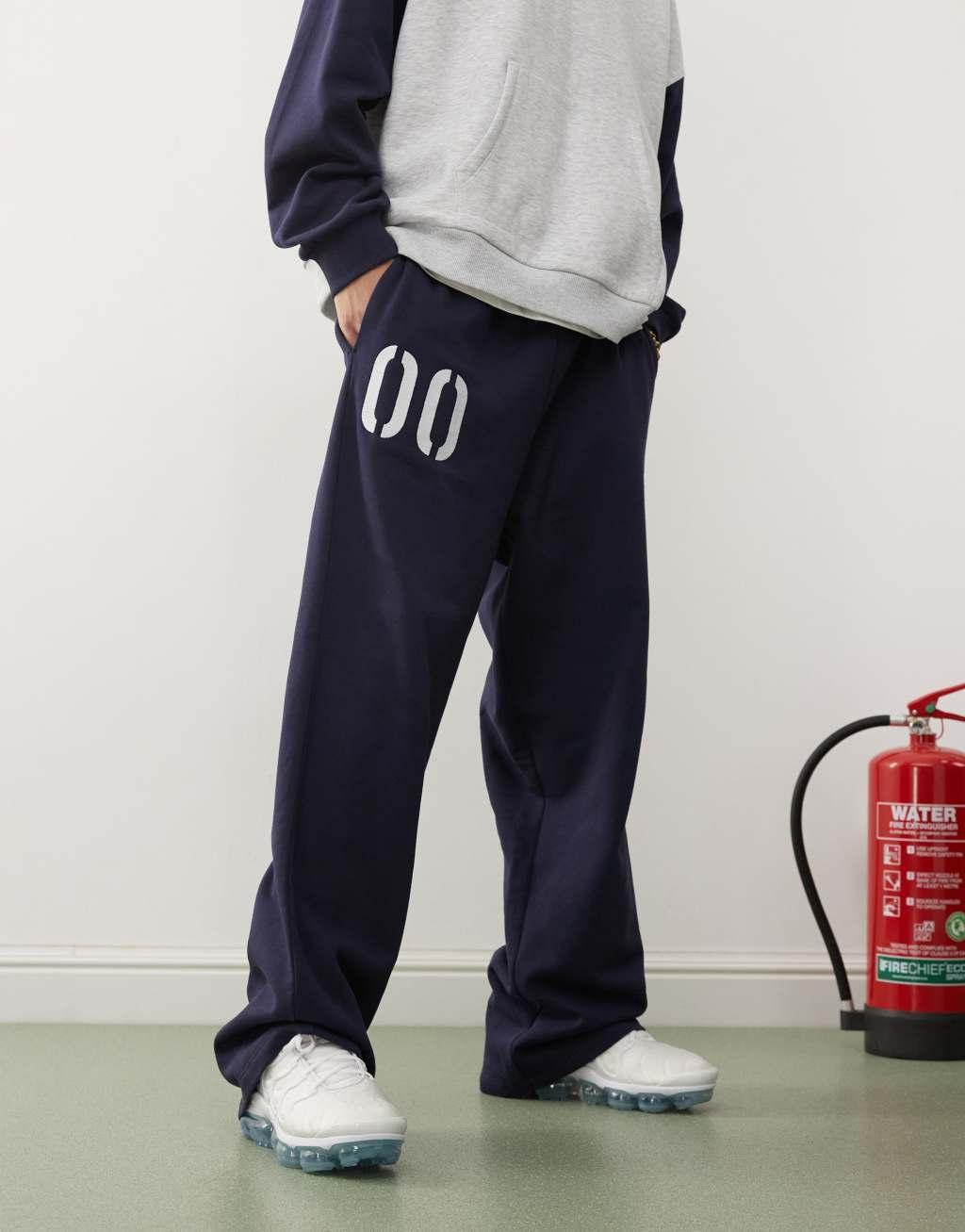 COLLUSION relaxed sweatpants with print in navy - part of a set Product Image