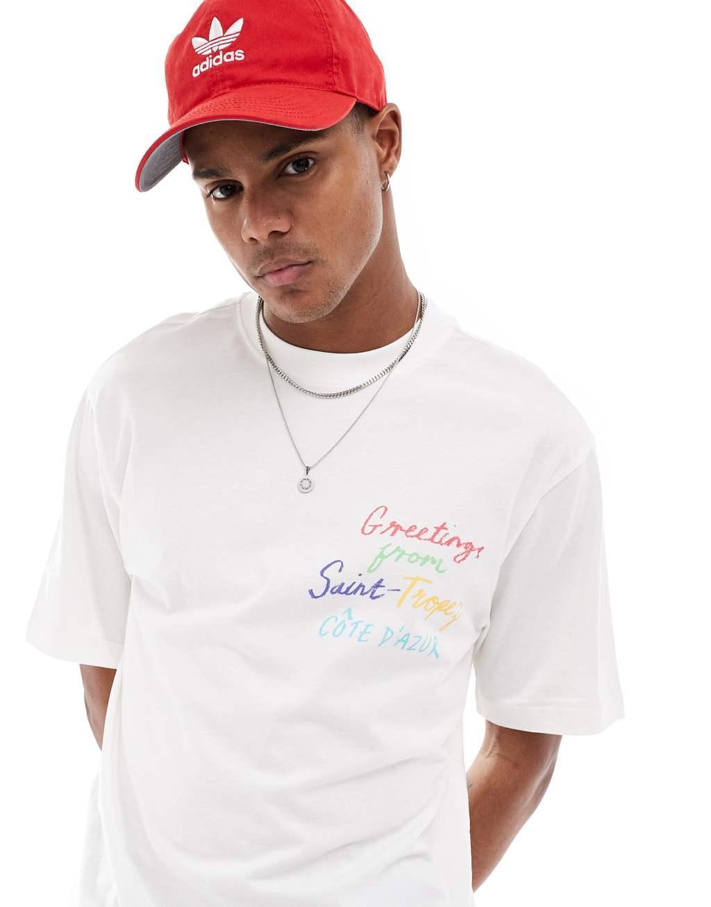 Only & Sons relaxed fit T-shirt with Saint Tropez pocket print in off white Product Image