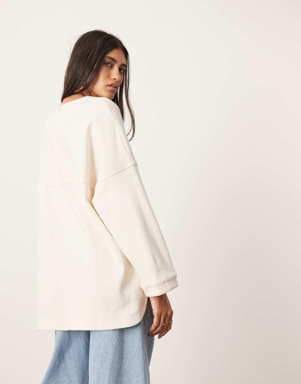 ASOS EDITION textured heavy weight jersey top with seam detail in ivory Product Image