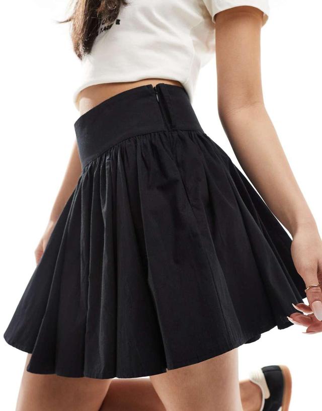 COLLUSION cotton flippy mini skirt in black Product Image