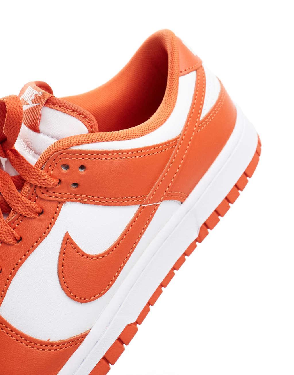 Nike Dunk Low Retro sneakers in white and orange Product Image