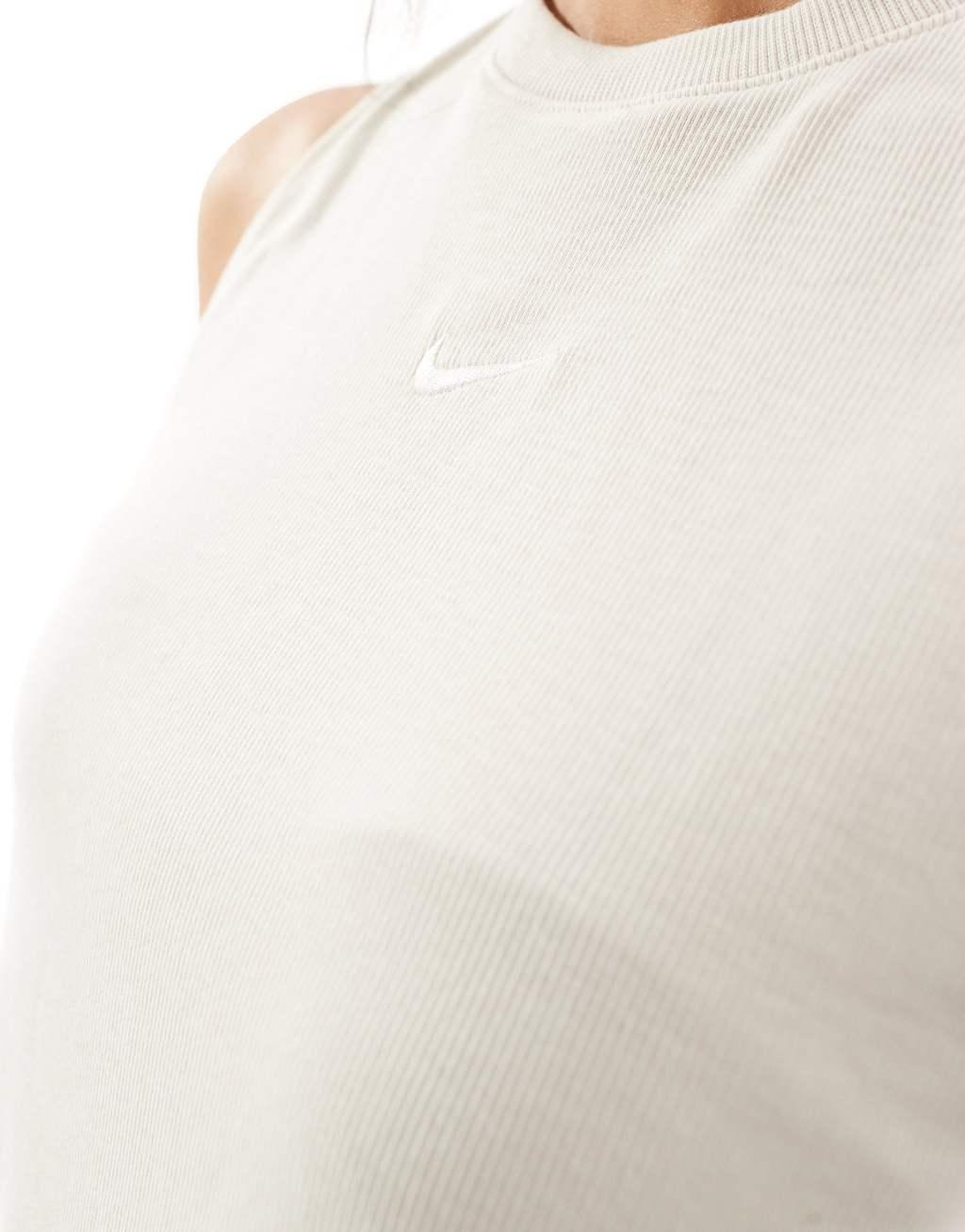 Nike Essential ribbed cropped tank top in beige Product Image