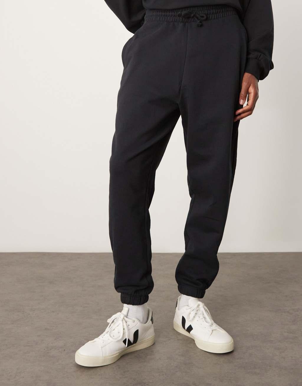 ASOS DESIGN essential oversized sweatpants in black Product Image