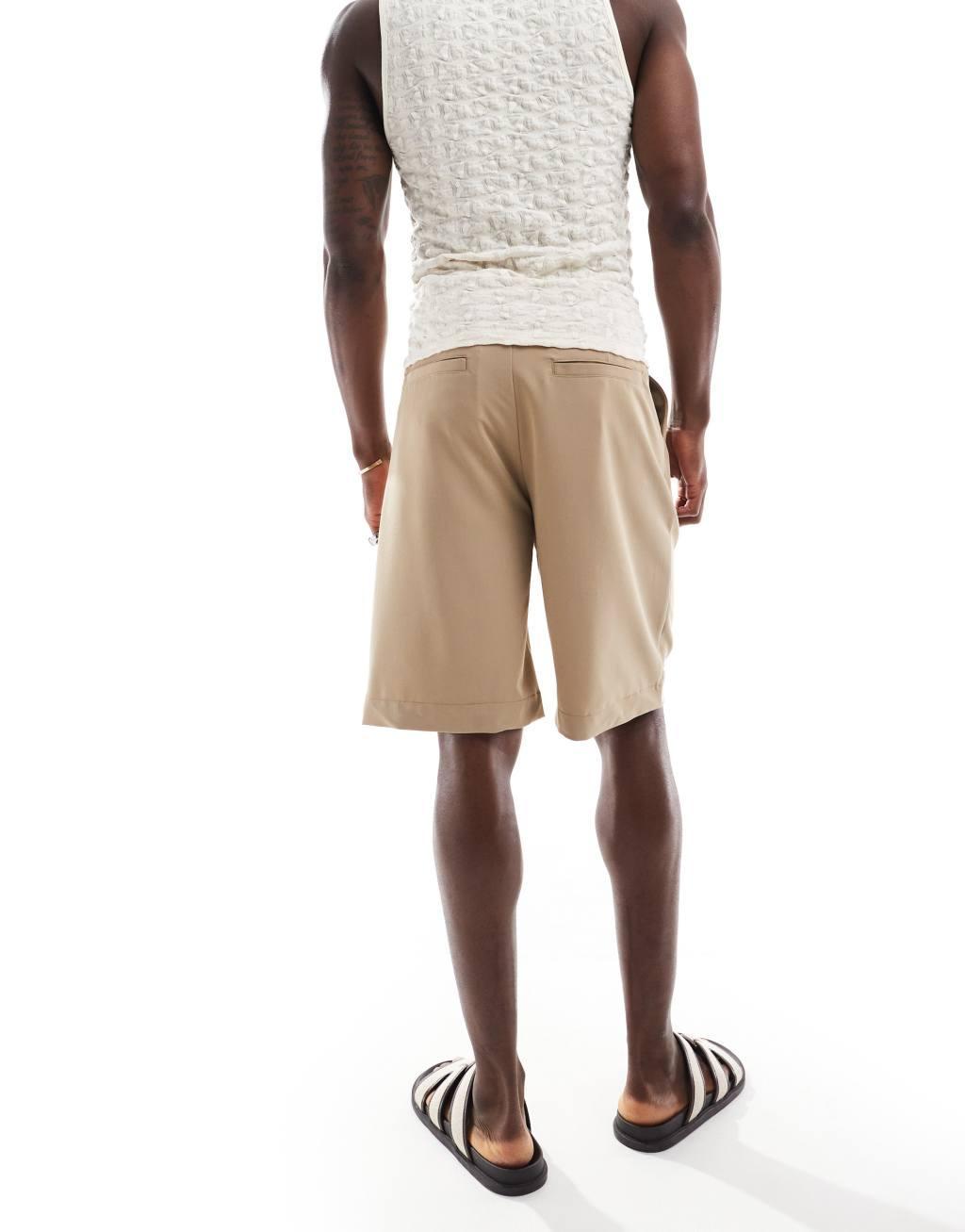 ONLY & SONS loose fit pleated tailored shorts in beige Product Image