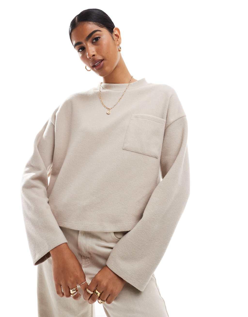 ASOS DESIGN supersoft oversized sweater with pocket detail in warm cream Product Image