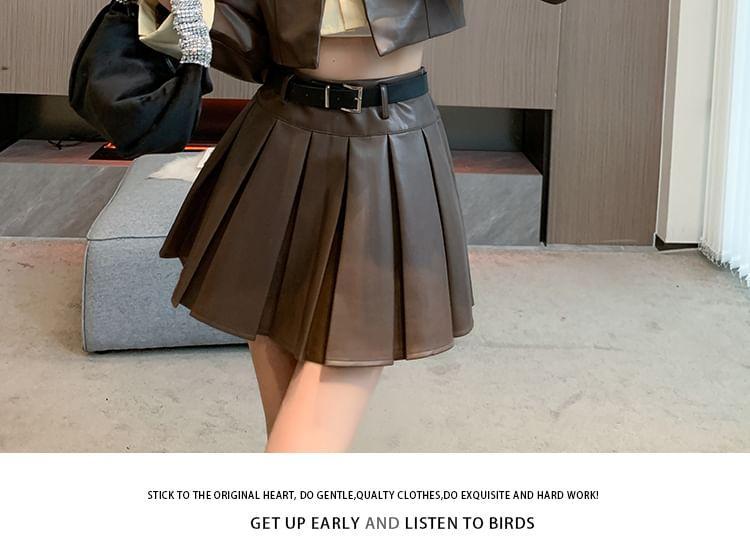 Set: Collared Mock Two Piece Faux Leather Crop Jacket + High Rise Plain Mini Pleated Skirt + Tank Top Product Image