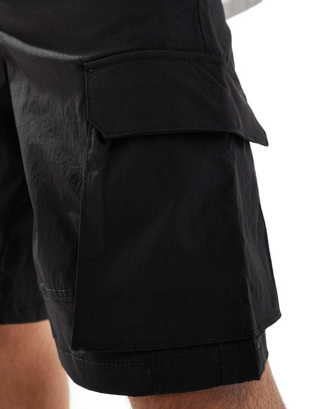 ADPT technical cargo short in black Product Image