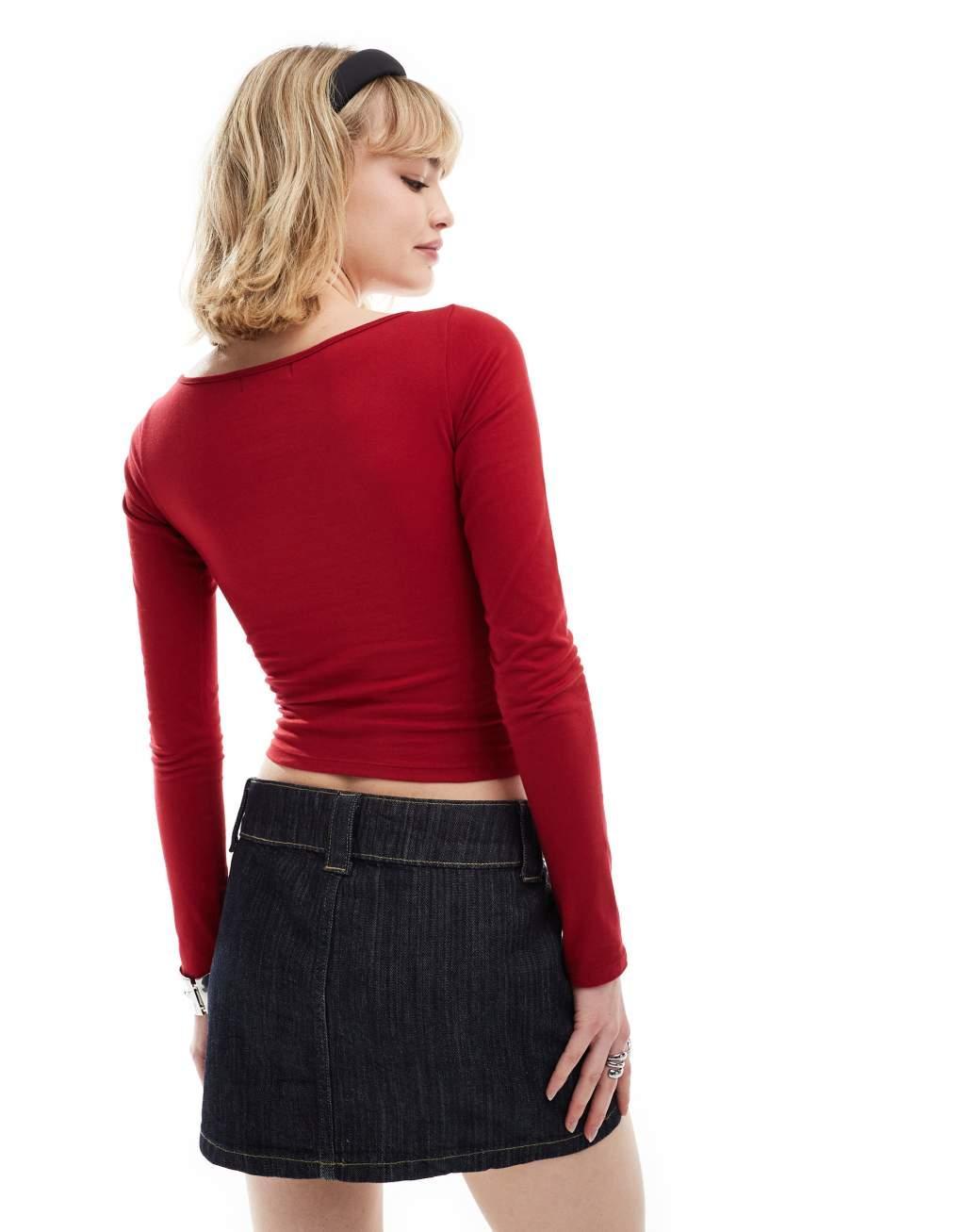 Motel amabon long sleeve slash neck top in red Product Image