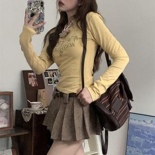 Long-Sleeve Lettering T-Shirt / Mid Waist Plaid Pleated Mini A-Line Skirt Product Image