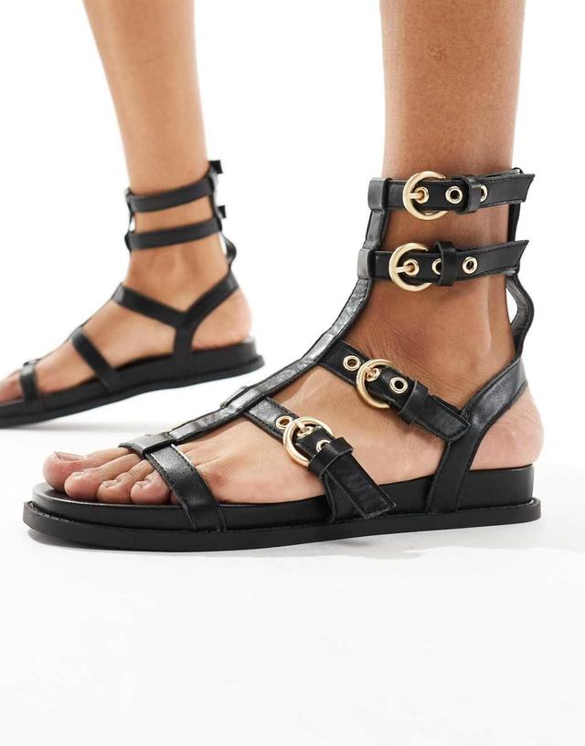 London Rebel studded gladiator sandals in black Product Image