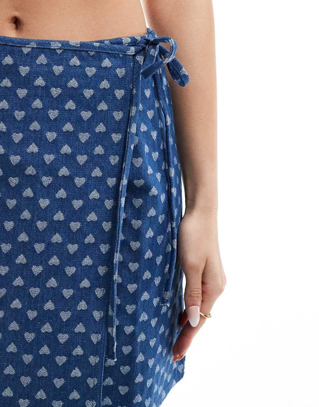 Pieces denim wrap skirt in mid blue with heart print Product Image