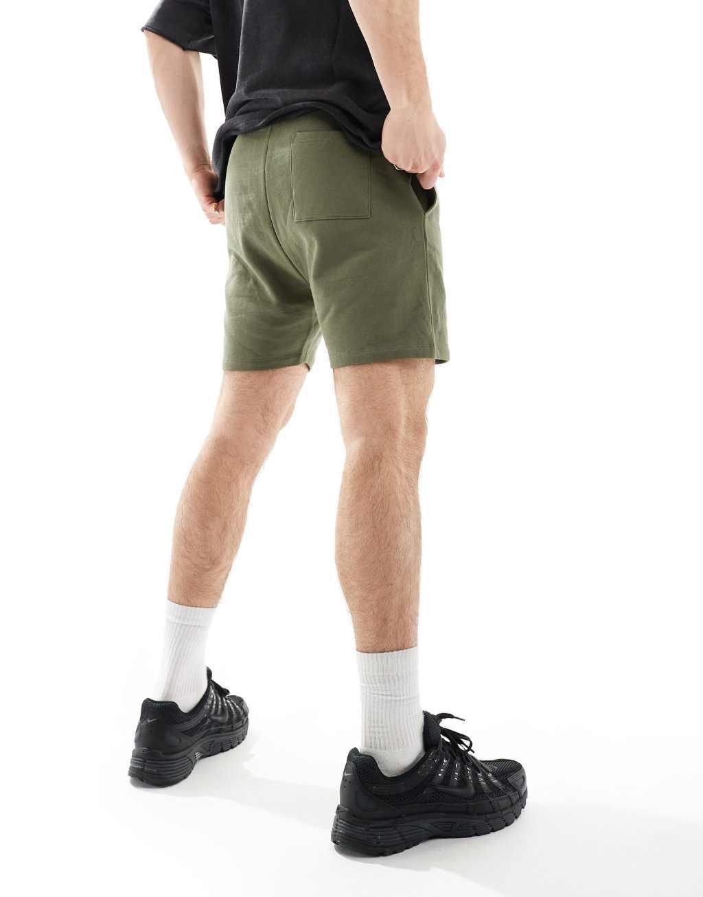 ASOS DESIGN skinny fit shorts in khaki Product Image