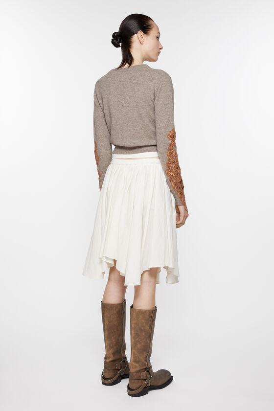 Asymmetric pleated skirt Product Image