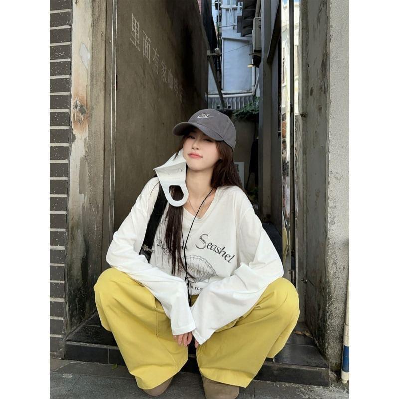 Long Sleeve Cold-Shoulder Graphic & Lettering Print Loose-Fit Pullover / High Waist Loose-Fit Wide-Leg Cargo Pants Product Image