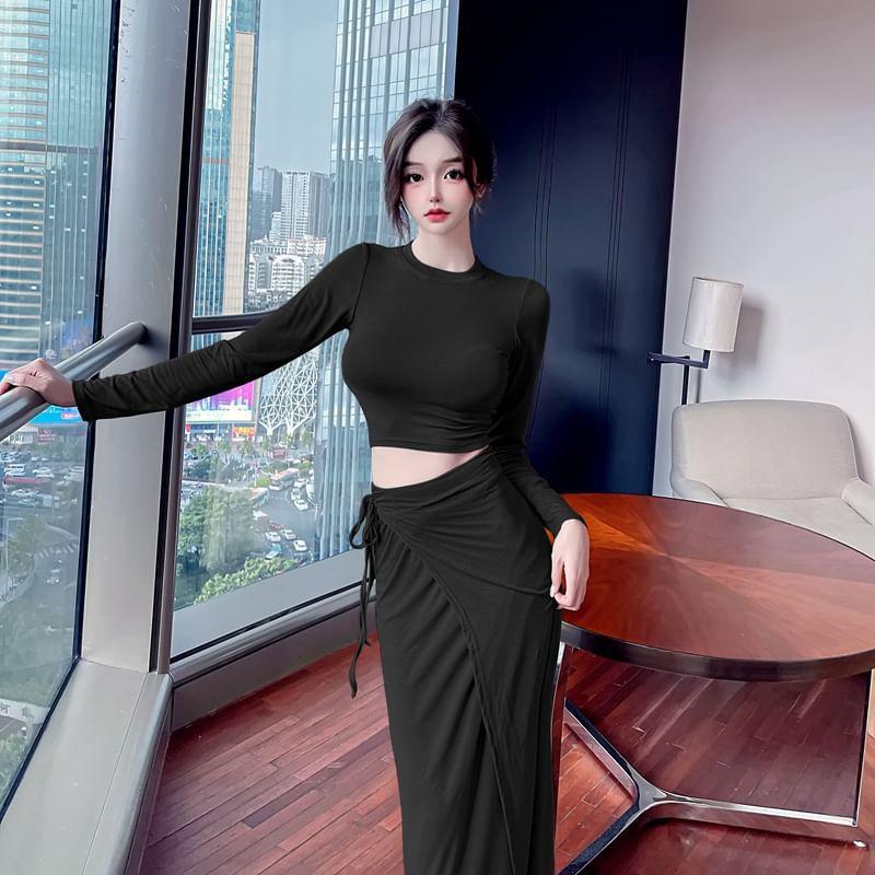 Set: Long-Sleeve Off Shoulder Plain Top + High Waist Asymmetrical Midi Skirt Product Image