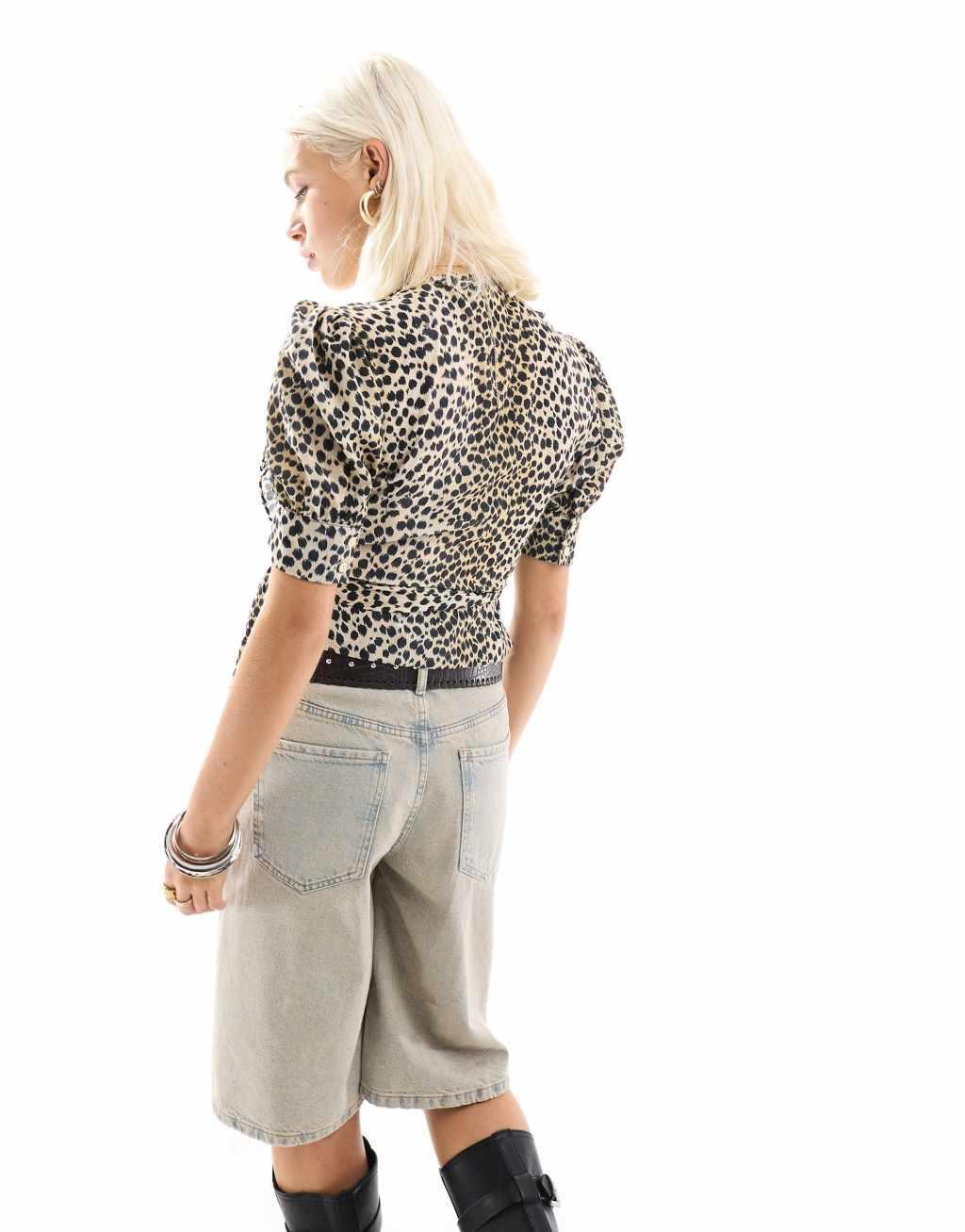 Reclaimed Vintage wraparound shirt with collar in animal print Product Image