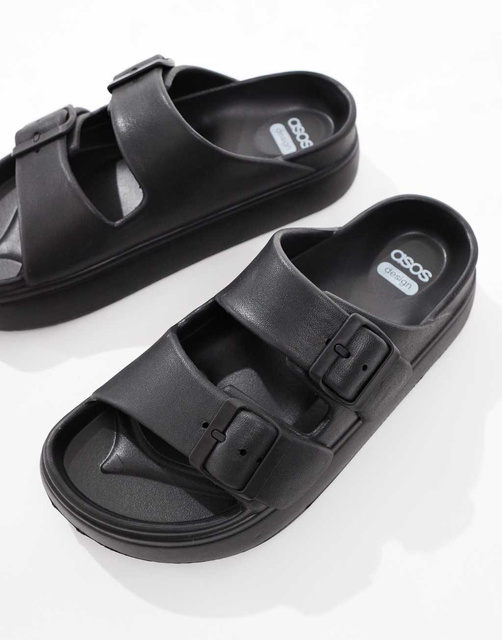 ASOS DESIGN Freestyle flatform double buckle footbed sliders in black Product Image