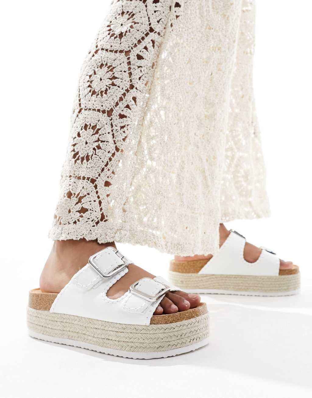 ASOS DESIGN Traffic double buckle flatform mules in white Product Image