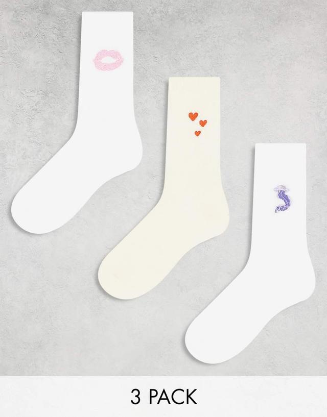 Monki 3 pack ankle socks in white with multi color embroidery motifs Product Image