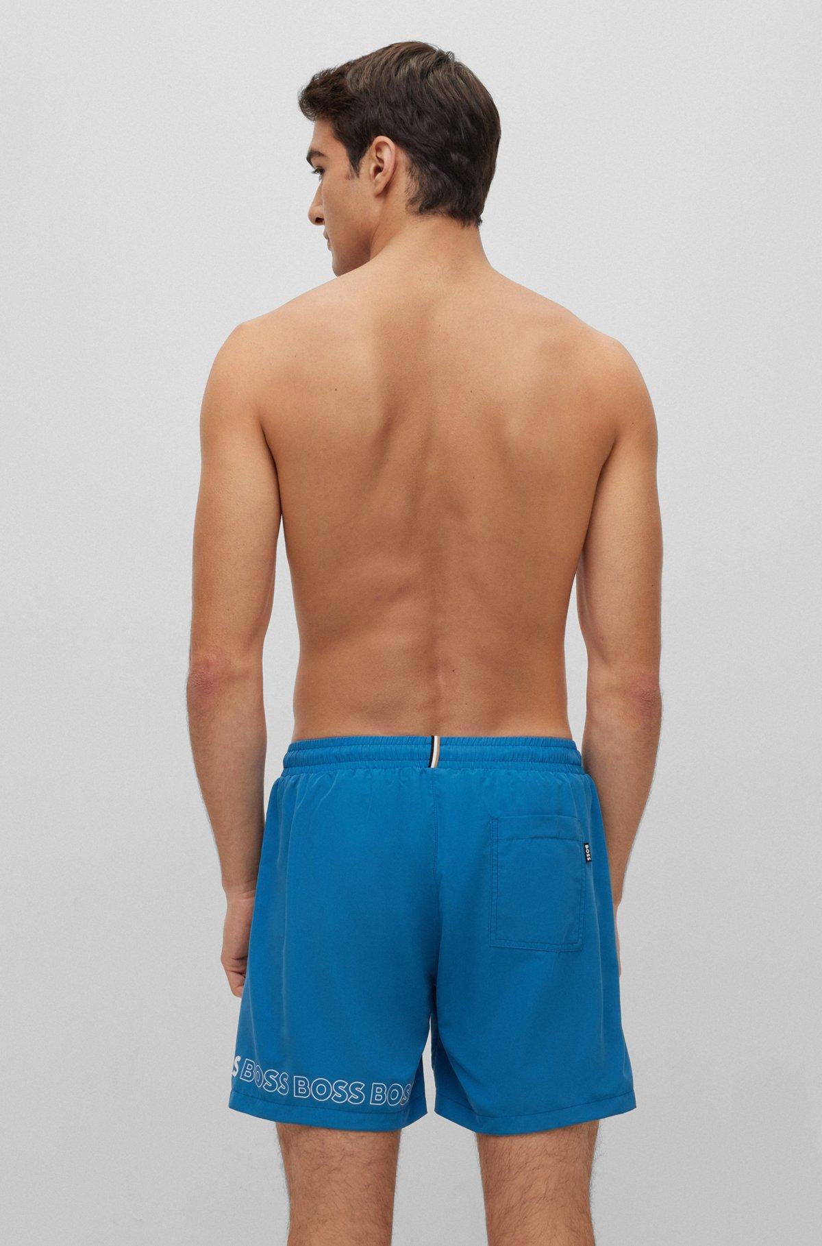 Swim shorts with repeat logos Product Image