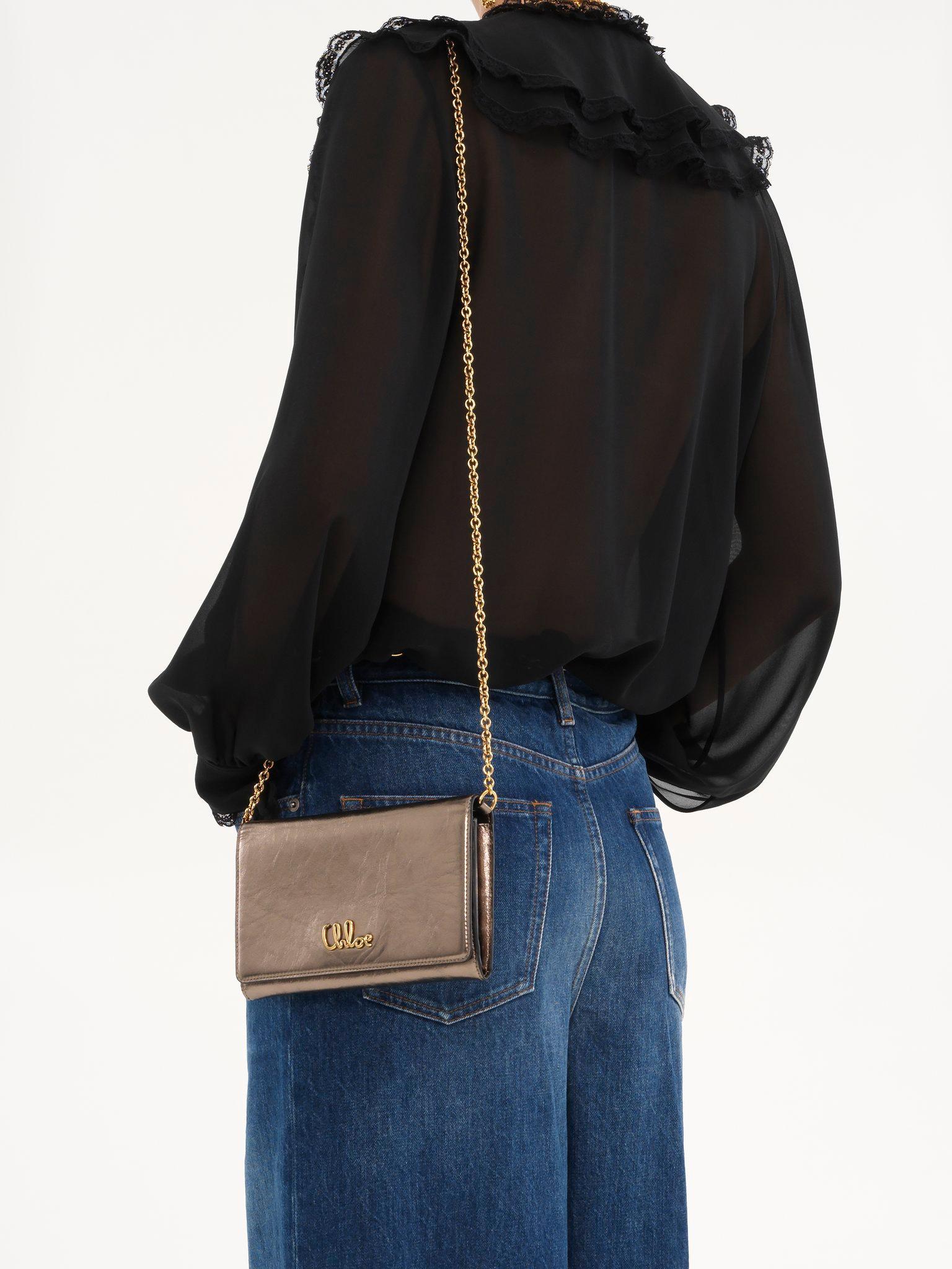 Chloé Iconic flap wallet on chain in metallized leather Product Image