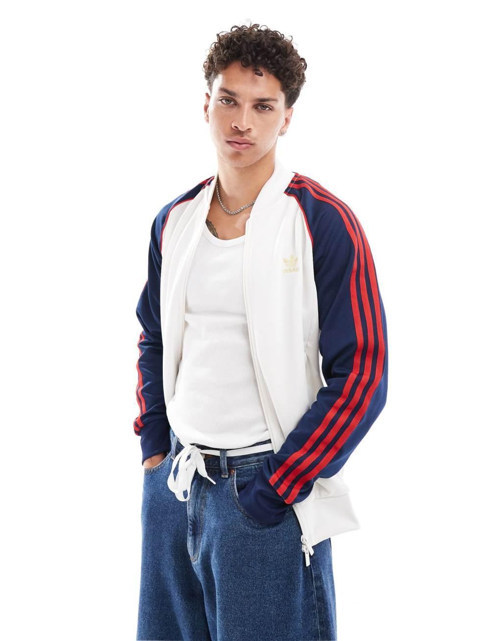 adidas Originals superstar tracktop in white & navy Product Image