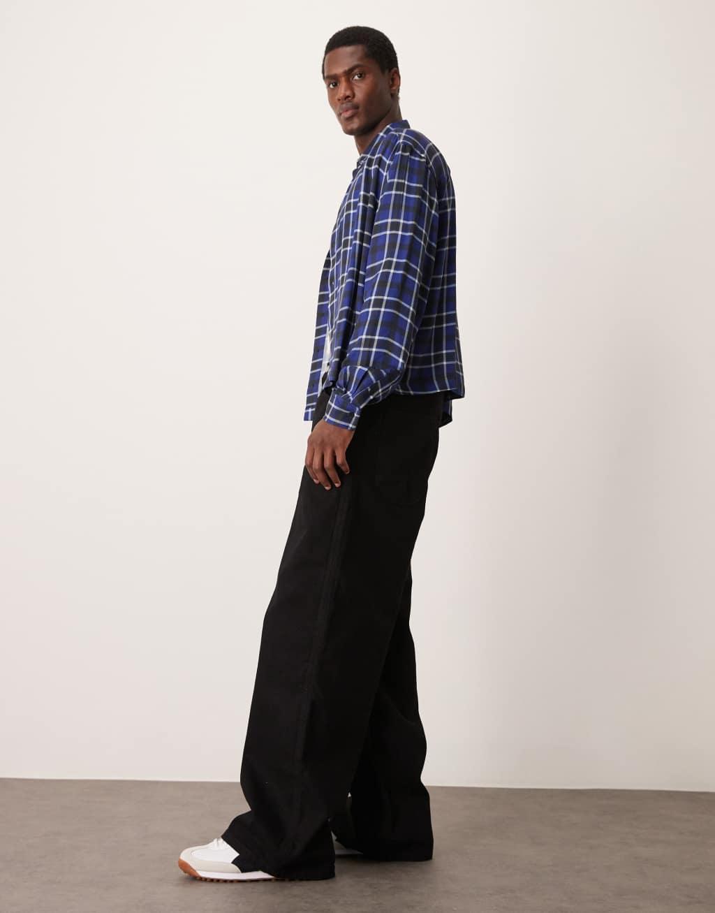 ASOS DESIGN super baggy jeans with elasticated back in black Product Image